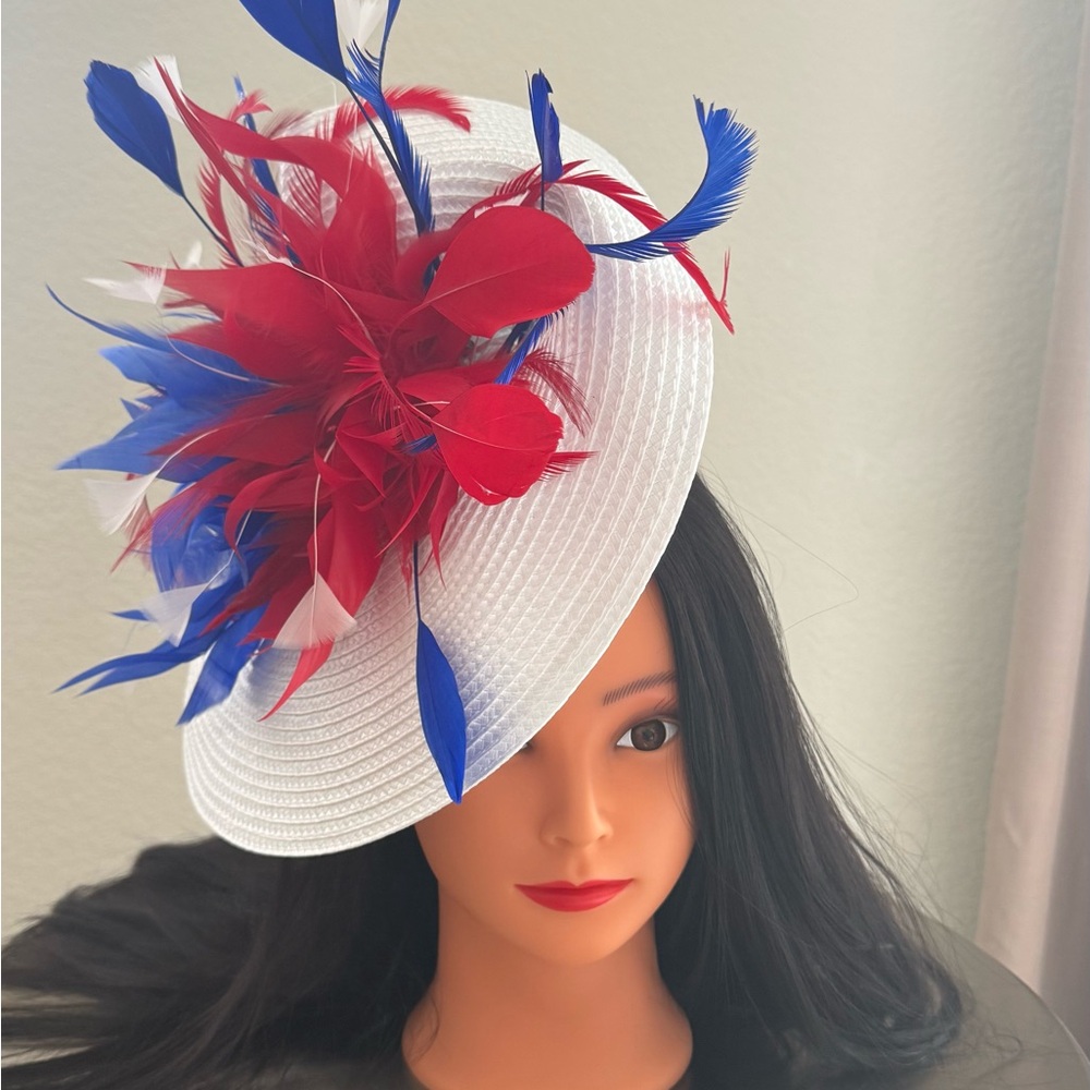 Vibrant White Hat with Red and Blue Feather Accents